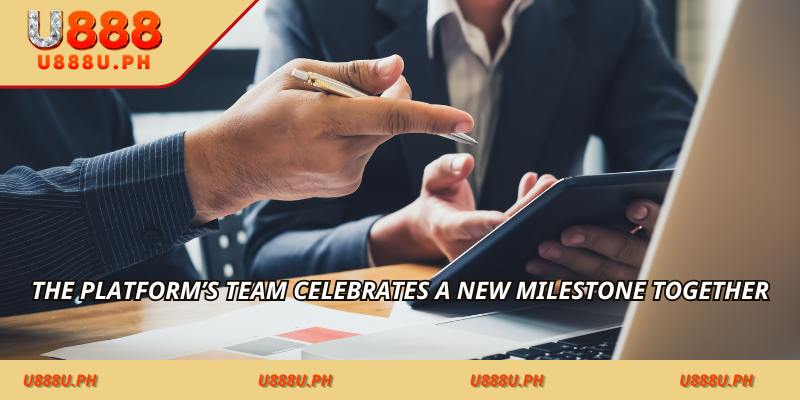The platform’s team celebrates a new milestone together